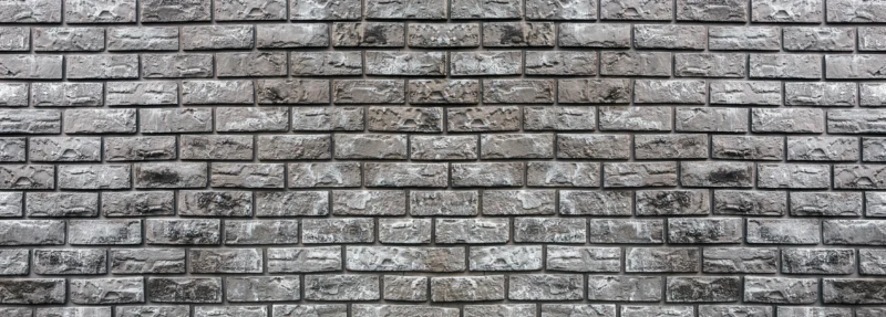 Küchenrückwand-Ziegelmauer aus dekorativem grauem Stein